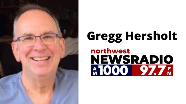 An older white man with a gray shirt smiling at the camera. "Gregg Hersholt" Northwest Newsradio logo.