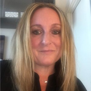 Kristin Estes, a member of AtWork!'s Board of Directors