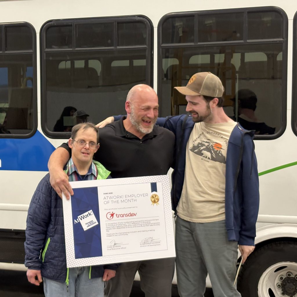 Allen, the leader of the Everett Transdev office with two of his AtWork! served employees. Jason on the left, Kyle on the right.